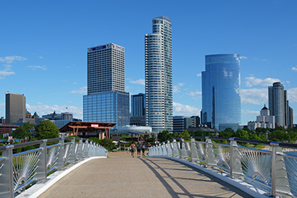 Pedestrian bridge with Milwaukee Skylline