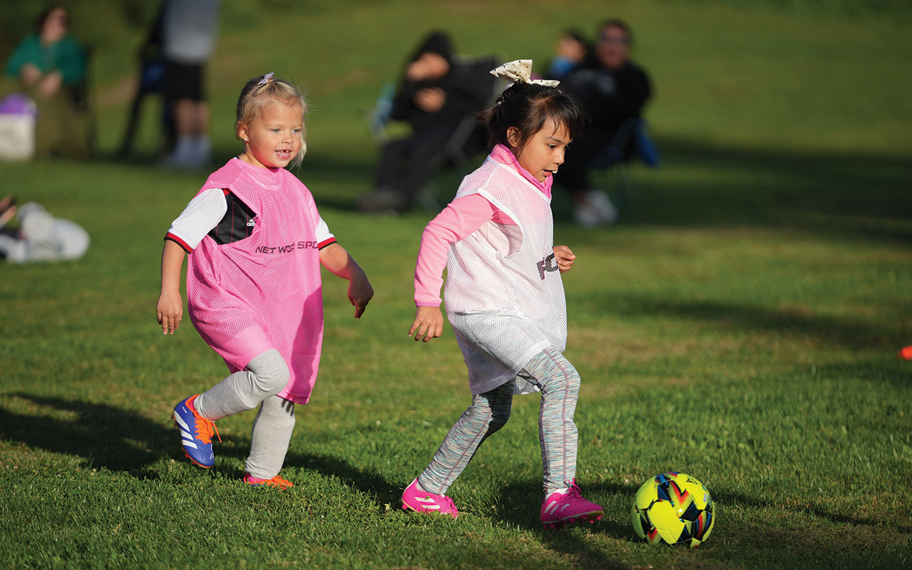Two girls participate in Street Dreams Soccer Academy’s new Little Dreamers camp