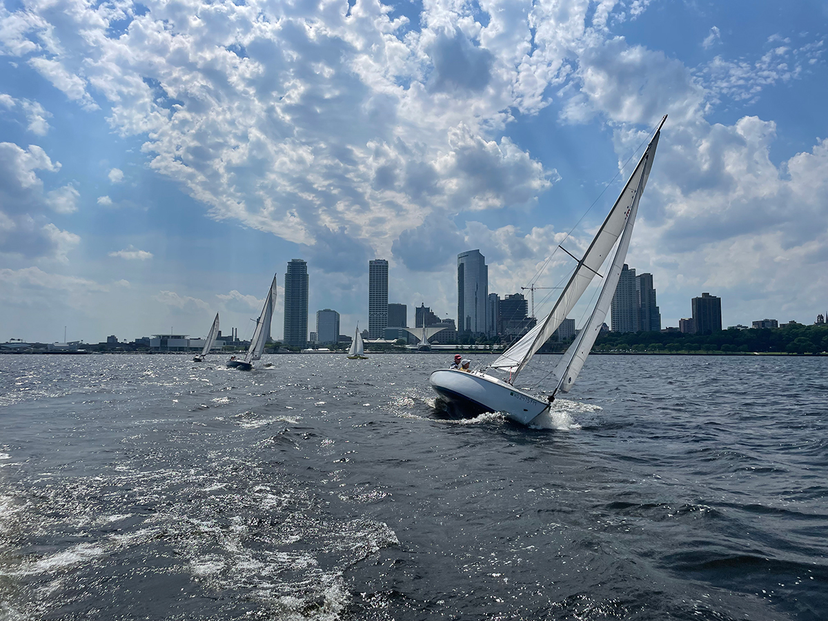 Sailboat on Lake Michigan with the Milwaukee skyline in the background.