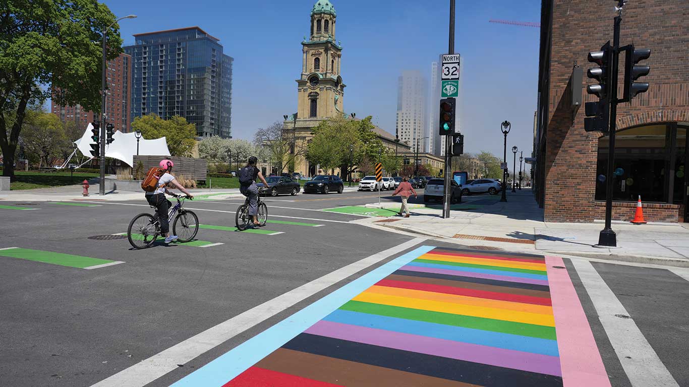 Rainbow crosswalks at Jefferson and Wells streets near Cathedral Square Park in Milwaukee. The park is where the first LGBTQ+ parade in Milwaukee ended.